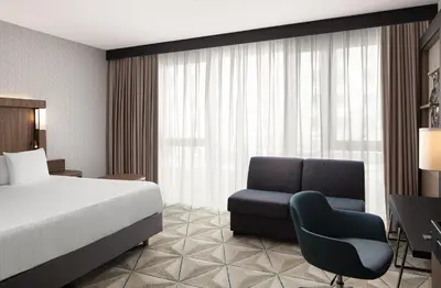 Un ou plusieurs lits dans un hébergement de l'établissement Courtyard by Marriott Paris Porte de Versailles