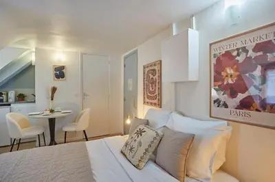 Coin salon dans l'établissement Studio Place Vendome by Studio prestige