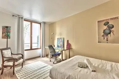 Un ou plusieurs lits dans un hébergement de l'établissement Appartement Dombasle Tour Eiffel - 3 étoiles - Welkeys