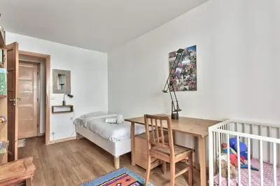 Un ou plusieurs lits dans un hébergement de l'établissement Appartement Dombasle Tour Eiffel - 3 étoiles - Welkeys