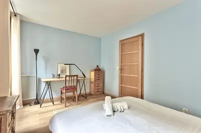 Un ou plusieurs lits dans un hébergement de l'établissement Appartement Dombasle Tour Eiffel - 3 étoiles - Welkeys
