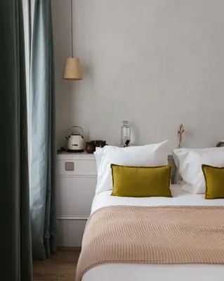 Un ou plusieurs lits dans un hébergement de l'établissement HOY Paris - Yoga Hotel