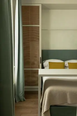 Un ou plusieurs lits dans un hébergement de l'établissement HOY Paris - Yoga Hotel