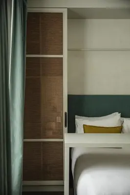 Un ou plusieurs lits dans un hébergement de l'établissement HOY Paris - Yoga Hotel