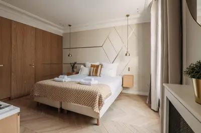 Un ou plusieurs lits dans un hébergement de l'établissement HIGHSTAY - Luxury Serviced Apartments - Rue de Rivoli
