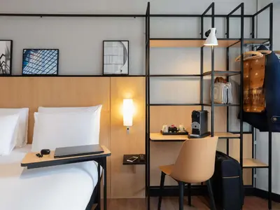 Un ou plusieurs lits dans un hébergement de l'établissement Ibis Paris Tour Eiffel Cambronne 15ème