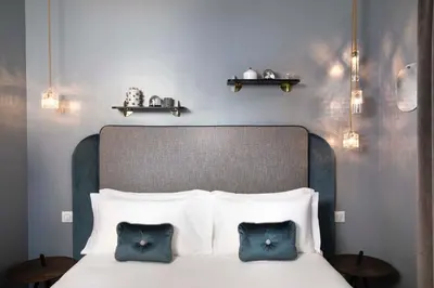 Un ou plusieurs lits dans un hébergement de l'établissement Hôtel Eiffel Saint Charles