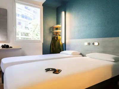 Un ou plusieurs lits dans un hébergement de l'établissement ibis budget Meudon Paris Ouest