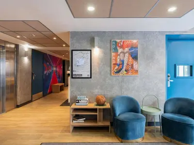 Coin salon dans l'établissement ibis budget Meudon Paris Ouest