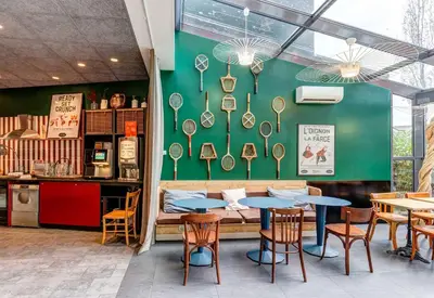 Restaurant ou autre lieu de restauration dans l'établissement B&B HOME Paris Nord 18ème