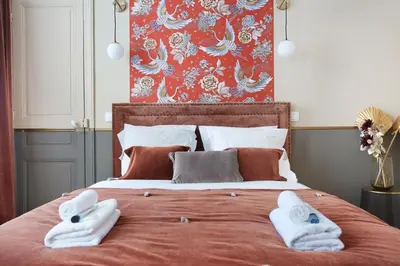 Un ou plusieurs lits dans un hébergement de l'établissement Apartment Champ de Mars - Tour Eiffel by Studio prestige
