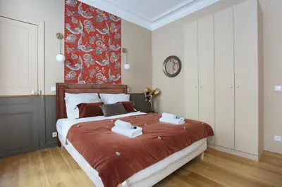 Un ou plusieurs lits dans un hébergement de l'établissement Apartment Champ de Mars - Tour Eiffel by Studio prestige
