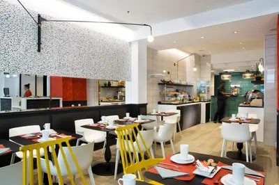 Restaurant ou autre lieu de restauration dans l'établissement Hotel Haussmann Saint Augustin