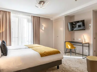 Un ou plusieurs lits dans un hébergement de l'établissement Mercure Paris Place d'Italie