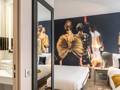 Un ou plusieurs lits dans un hébergement de l'établissement Mercure Paris Place d'Italie