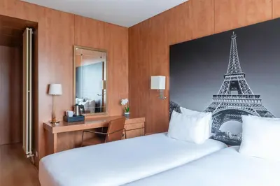 Un ou plusieurs lits dans un hébergement de l'établissement Best Western Ronceray Opéra