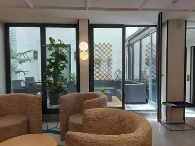 Coin salon dans l'établissement Mercure Paris Arc de Triomphe Wagram