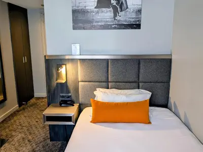 Un ou plusieurs lits dans un hébergement de l'établissement Best Western Empire Elysees