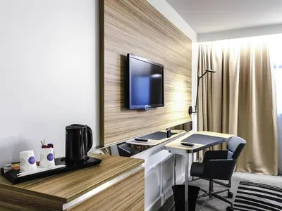 Télévision ou salle de divertissement dans l'établissement Novotel Paris 14 Porte d'Orléans