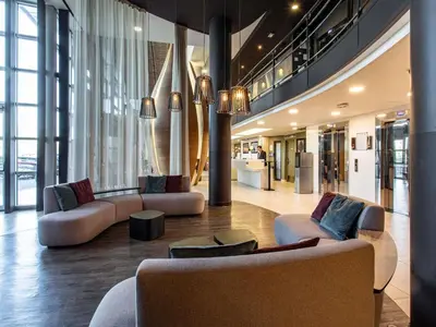 Coin salon dans l'établissement Novotel Paris 14 Porte d'Orléans
