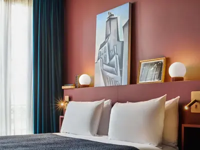 Un ou plusieurs lits dans un hébergement de l'établissement Mercure Paris Tour Eiffel Pont Mirabeau