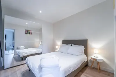 Un ou plusieurs lits dans un hébergement de l'établissement GH Apartment Pasteur-Montparnasse