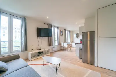Télévision ou salle de divertissement dans l'établissement GH Apartment Pasteur-Montparnasse