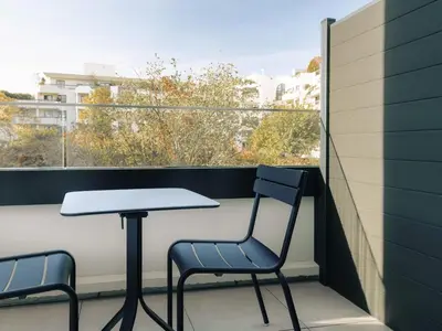 Balcon ou terrasse dans l'établissement Novotel Paris Suresnes Longchamp