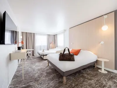 Télévision ou salle de divertissement dans l'établissement Novotel Paris 13 Porte d'Italie
