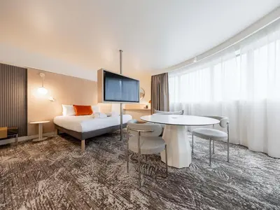 Télévision ou salle de divertissement dans l'établissement Novotel Paris 13 Porte d'Italie