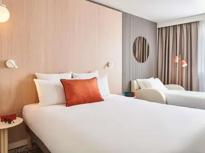 Un ou plusieurs lits dans un hébergement de l'établissement Novotel Paris 13 Porte d'Italie