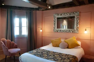 Un ou plusieurs lits dans un hébergement de l'établissement Hôtel Petit Saint-Honoré