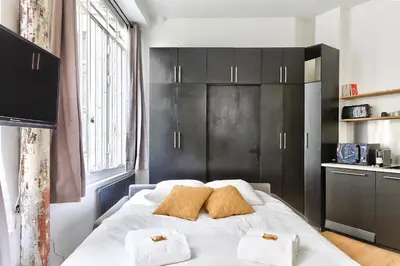 Un ou plusieurs lits dans un hébergement de l'établissement NEW Loft Apartment in the Heart of Paris - An Ecoloflat