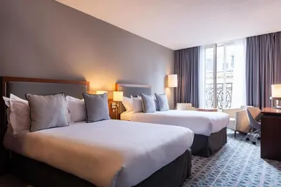 Un ou plusieurs lits dans un hébergement de l'établissement Crowne Plaza Paris - Republique by IHG