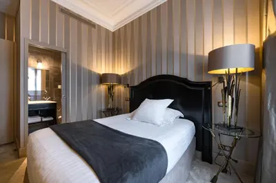 Un ou plusieurs lits dans un hébergement de l'établissement Villa Glamour