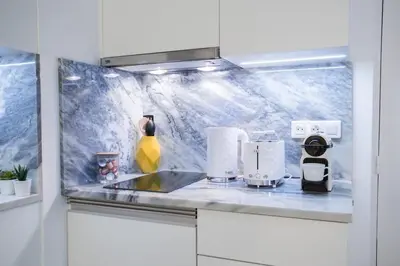 Cuisine ou kitchenette dans l'établissement La Boutique du Sentier