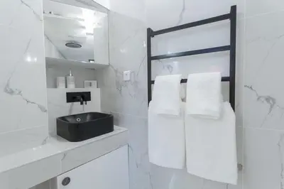 Salle de bains dans l'établissement La Boutique du Sentier