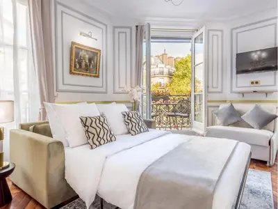 Un ou plusieurs lits dans un hébergement de l'établissement Merveil - Luxury Suite - Louvre -Sebastopol I