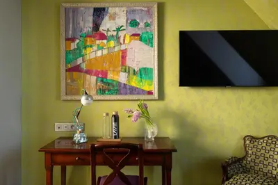 Télévision ou salle de divertissement dans l'établissement Hôtel Le Relais des Halles