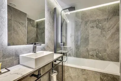Salle de bains dans l'établissement Hotel Beausejour