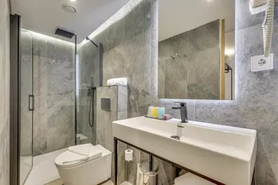 Salle de bains dans l'établissement Hotel Beausejour