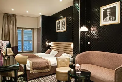Coin salon dans l'établissement Hôtel ICÔNE