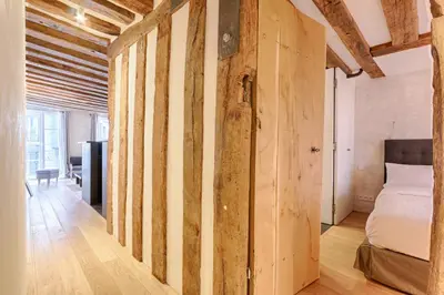 Un ou plusieurs lits dans un hébergement de l'établissement Outstanding Luxury Flat 4P-Boulevard Saint Germain