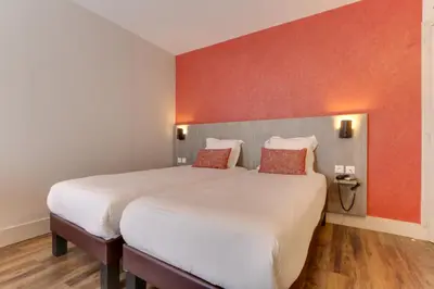 Un ou plusieurs lits dans un hébergement de l'établissement Sure Hotel by Best Western Paris Gare du Nord