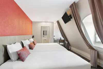 Un ou plusieurs lits dans un hébergement de l'établissement Sure Hotel by Best Western Paris Gare du Nord