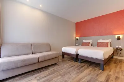 Un ou plusieurs lits dans un hébergement de l'établissement Sure Hotel by Best Western Paris Gare du Nord