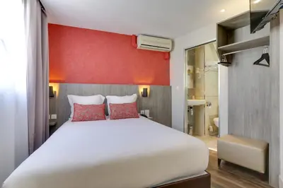 Un ou plusieurs lits dans un hébergement de l'établissement Sure Hotel by Best Western Paris Gare du Nord