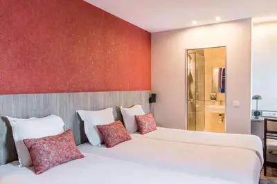 Un ou plusieurs lits dans un hébergement de l'établissement Sure Hotel by Best Western Paris Gare du Nord