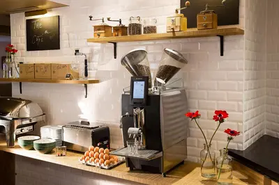 Cuisine ou kitchenette dans l'établissement Hotel Le Chat Noir
