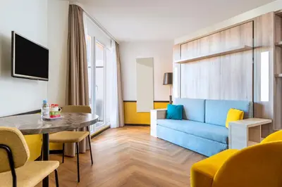 Coin salon dans l'établissement Aparthotel Adagio Paris Montrouge